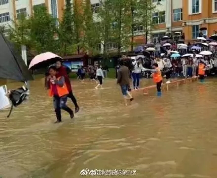 Students slammed as 'lazy' after female sanitation workers carry scholars over flooded campus