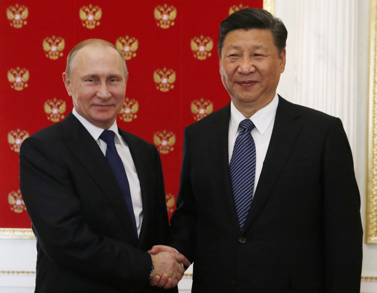 Xi, Putin agree to boost coordination on major issues