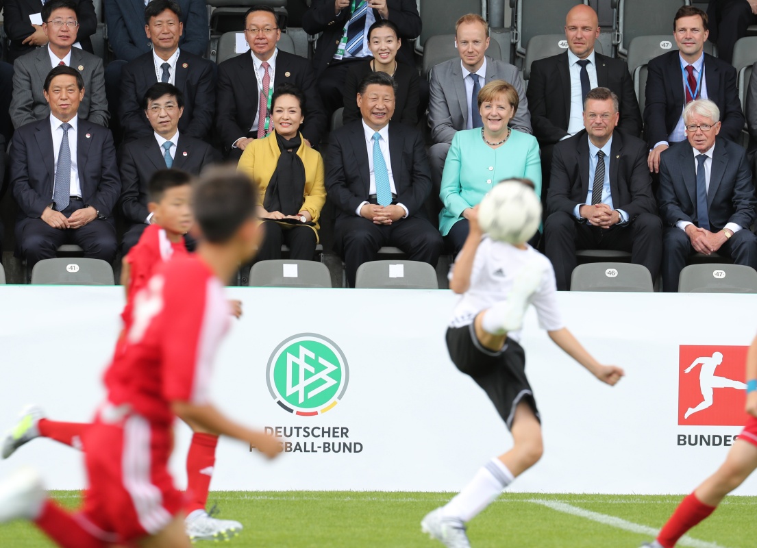 Xi, Merkel watch football match between Chinese, German youth teams