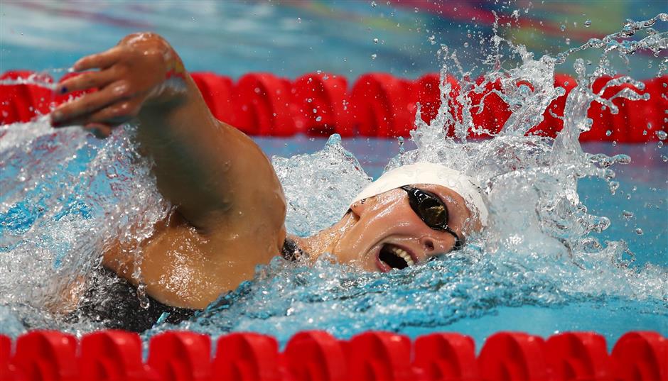 Ledecky off to a blazing start on very busy week at worlds