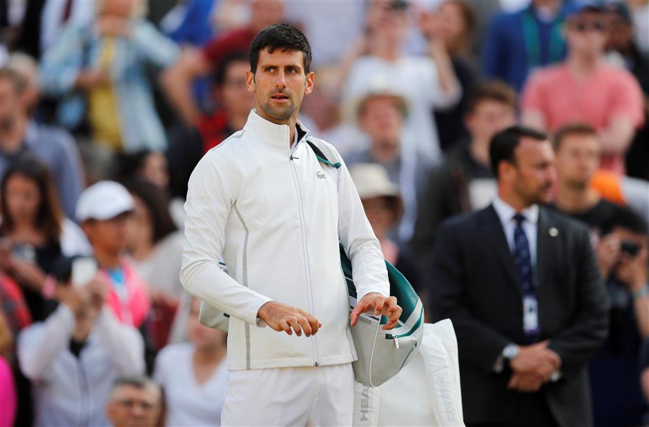 Elbow injury may rule Djokovic out of US Open