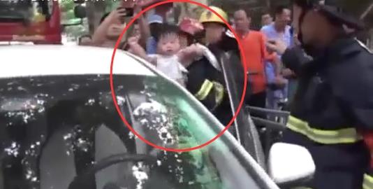 Firefighters rescue toddler from locked car during heatwave