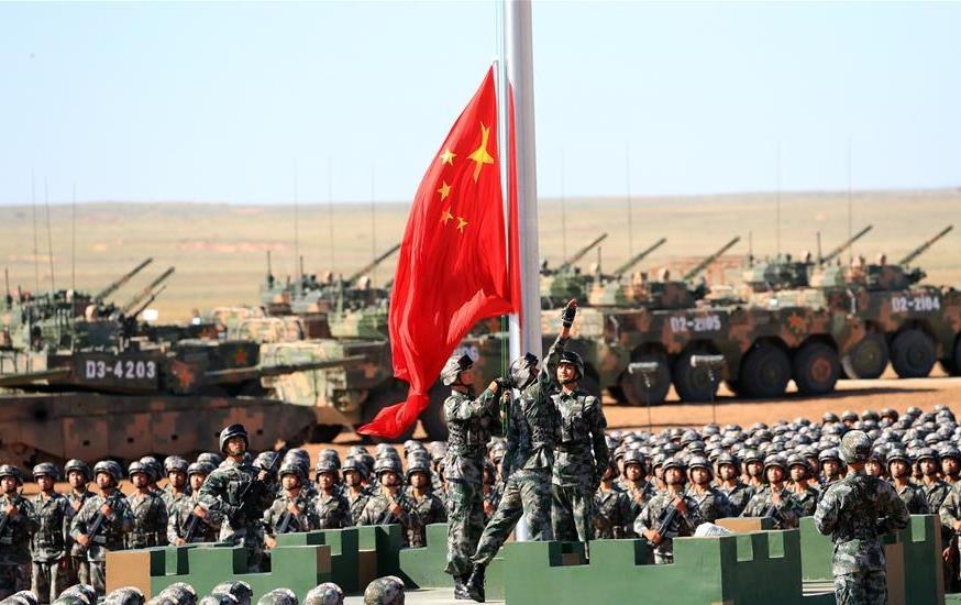 Xi reviews parade in field for first time