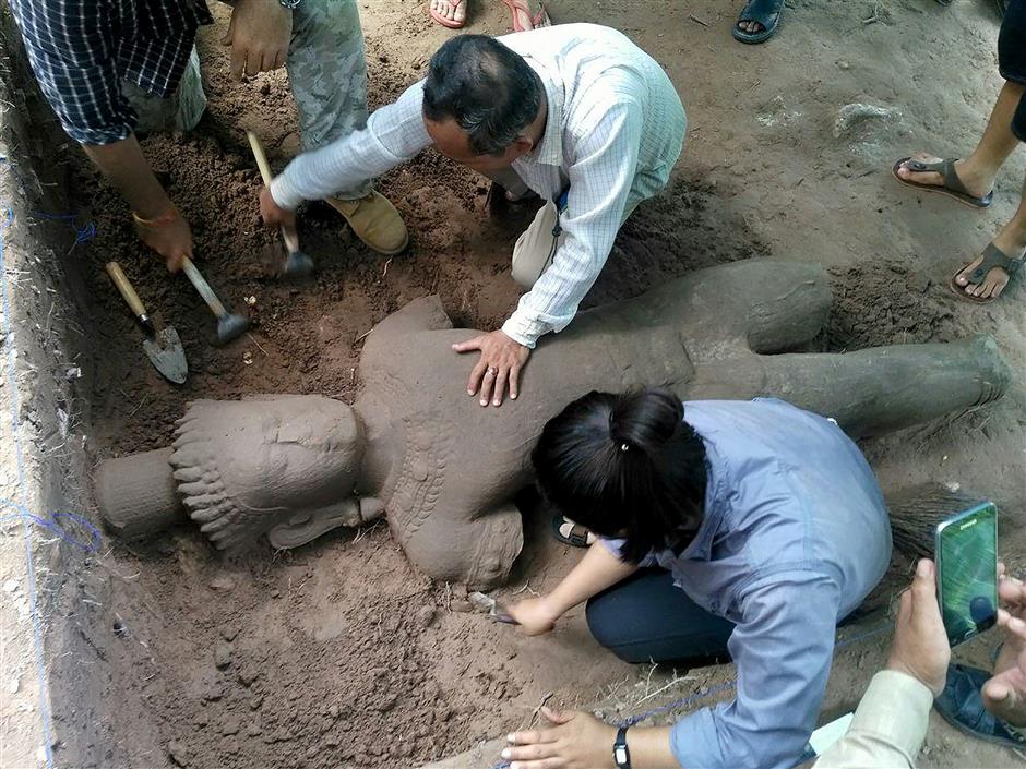 Ancient statue unearthed at Cambodia's Angkor complex