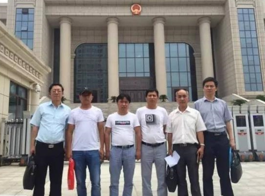 Four acquitted Chinese men get millions of state compensation