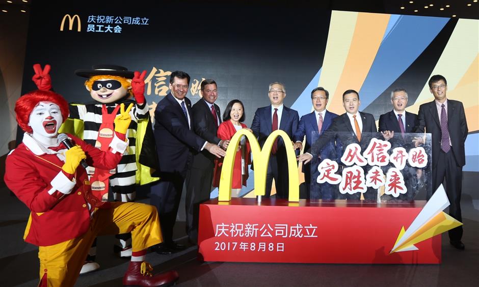 McDonald's sells stake to new firm to run its outlets on the mainland and HK