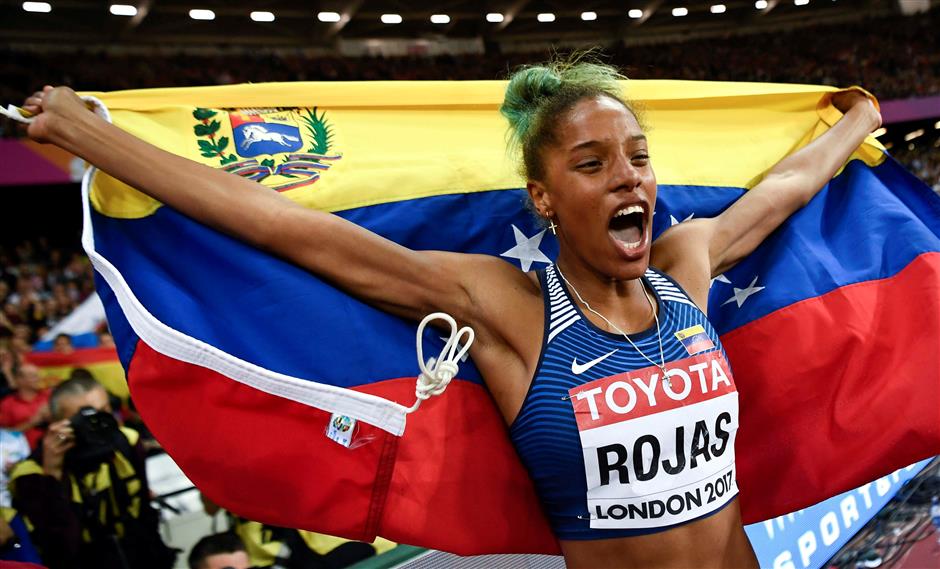 Rojas wins triple jump to claim Venezuela's first world title