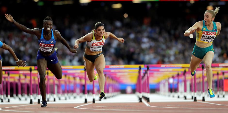 Pearson, Harper-Nelson lead way in 100 hurdles at worlds