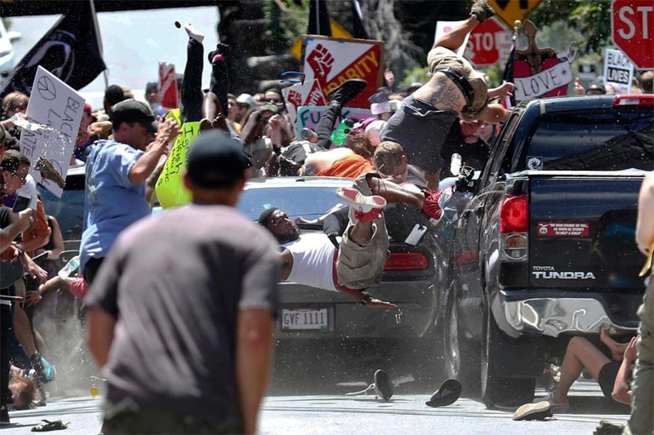 Man recounts pushing fiancee away from car during protest