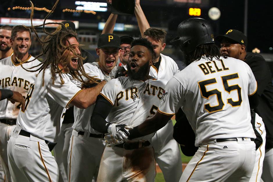 Pirates' 10th-inning homer spells heartbreak for Dodgers' Hill