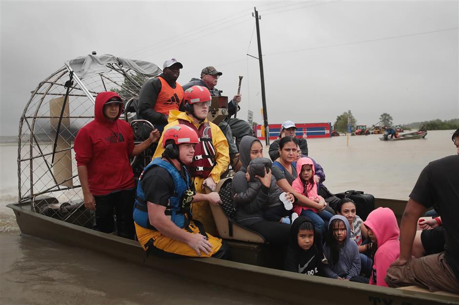 Trump to visit storm-ravaged Texas, region braces for more rain