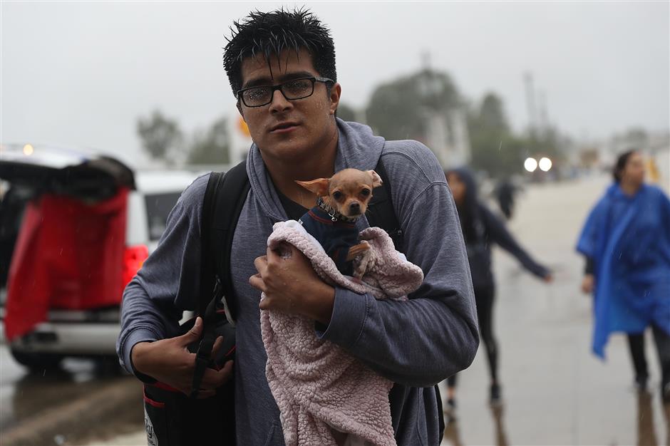 Trump to visit storm-ravaged Texas, region braces for more rain