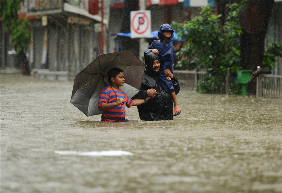 Heavy monsoon rains paralyze Mumbai