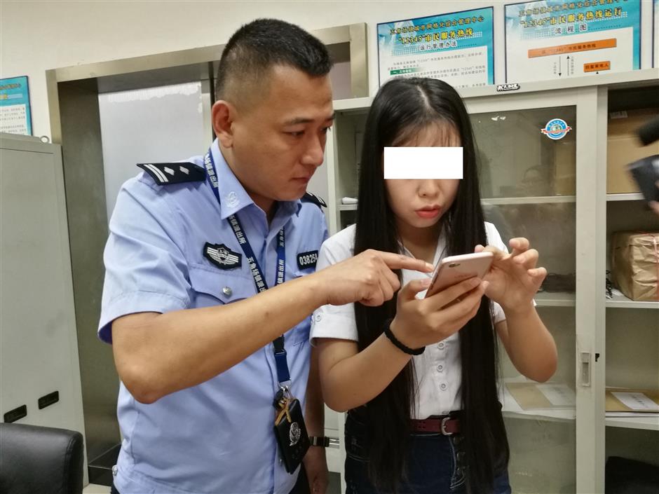Police break in woman's door in bizarre phone scam case