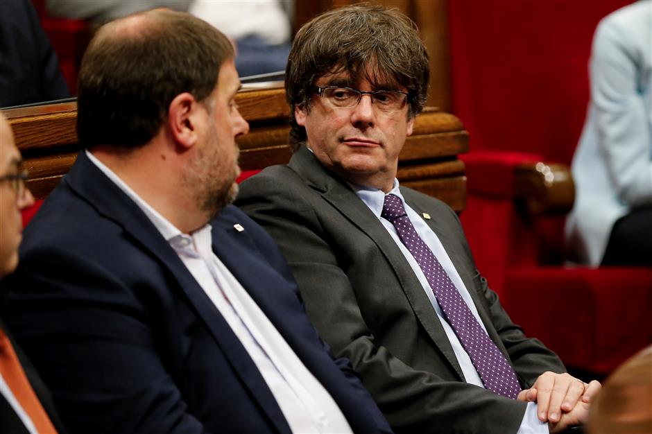 Spain seeks criminal charges against Catalonia House members