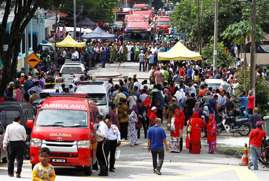 Blaze at Malaysian religious school kills 23, mostly children