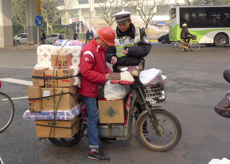 Shanghai points to problems with its traffic system