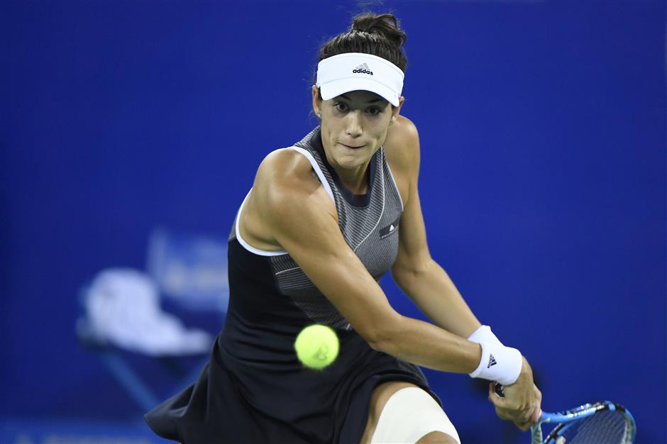 Muguruza powers into Wuhan quarters