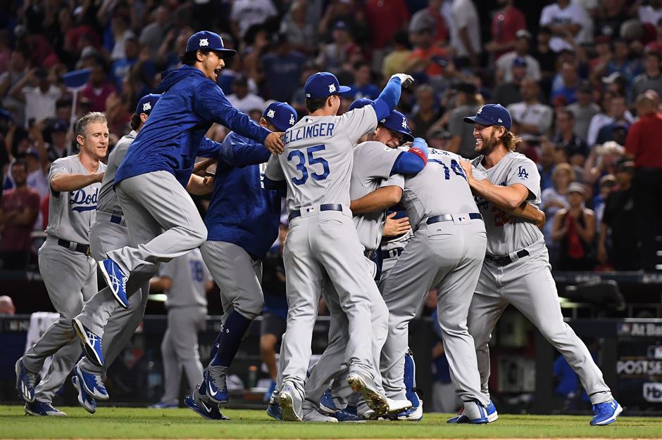 Astros, Dodgers advance in MLB playoffs