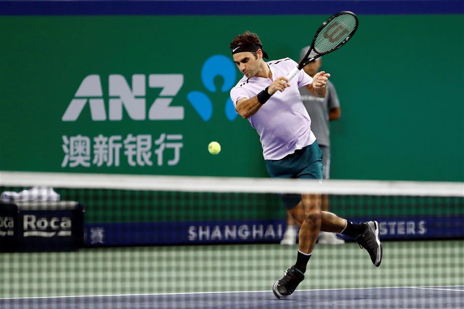 Nadal, Federer on course as Wu exits