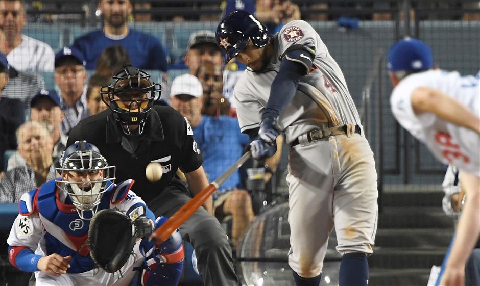 Springer's HR in 11th gives Astros wild win over Dodgers as Series tied