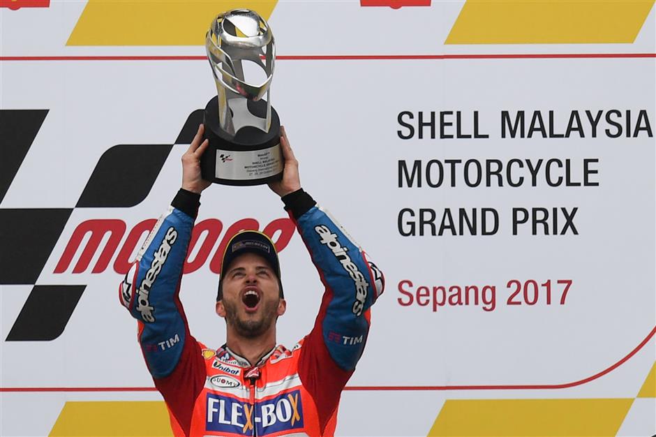 Dovizioso's Malaysia victory keeps MotoGP title race alive