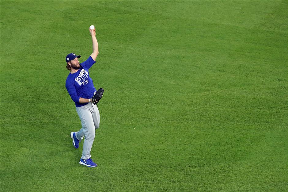 Kershaw gets early start on ace matchup vs Keuchel in Game 5