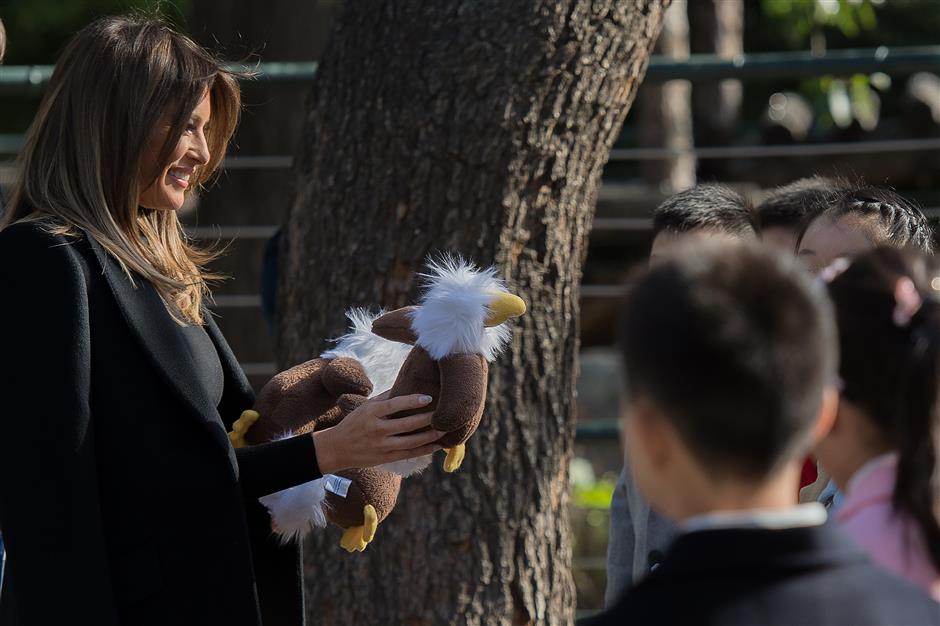 Melania Trump meets China's furry diplomats, hikes Great Wall