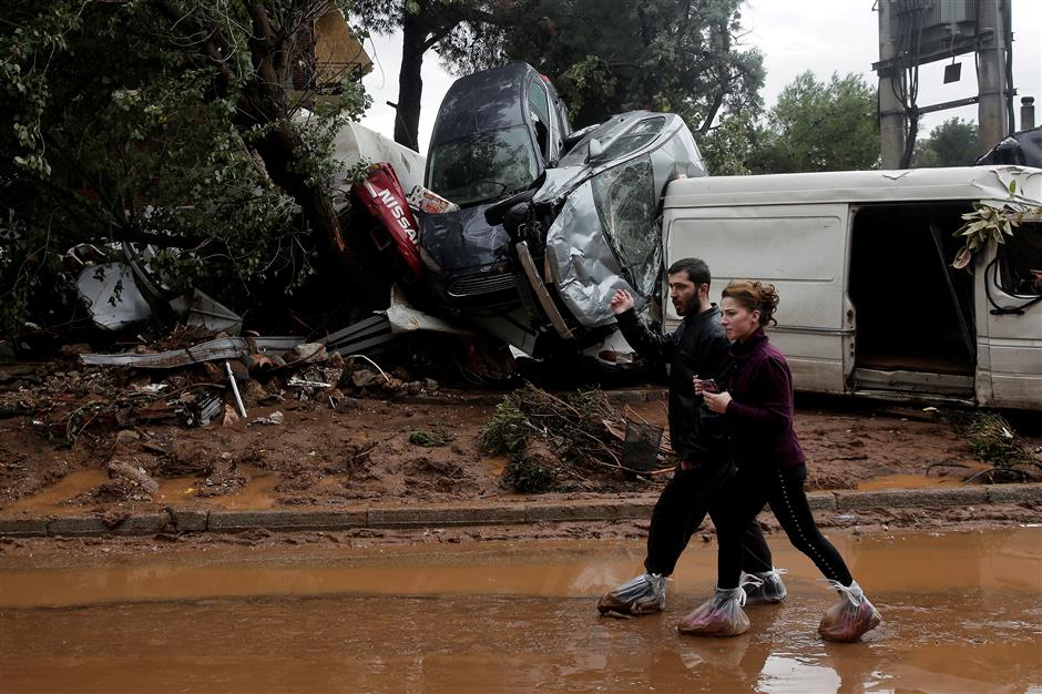 Greeks in mourning and disbelief after flood that killed at least 15