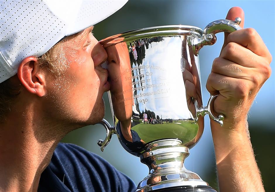 Stunned Davis captures Australian Open after Day blows up