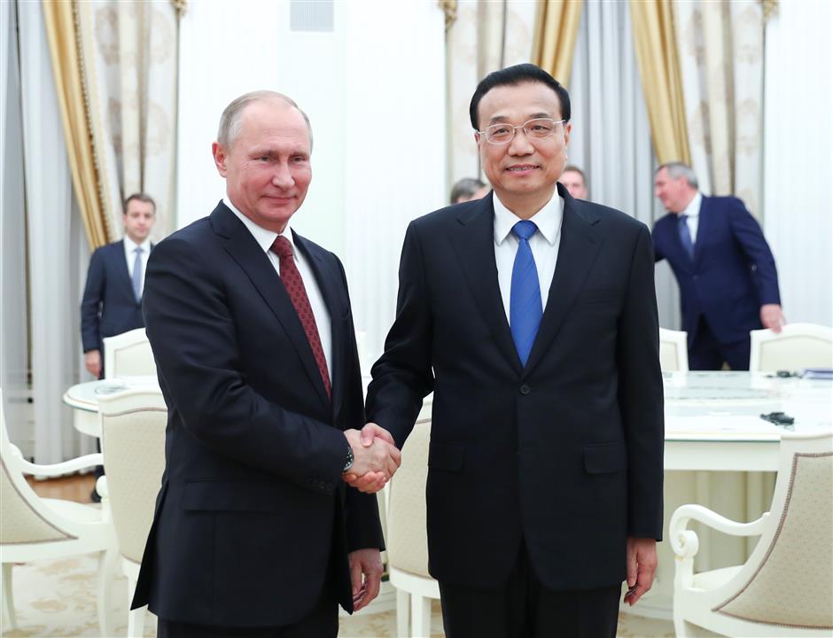 Chinese premier pledges joint efforts with Russia to promote regional cooperation