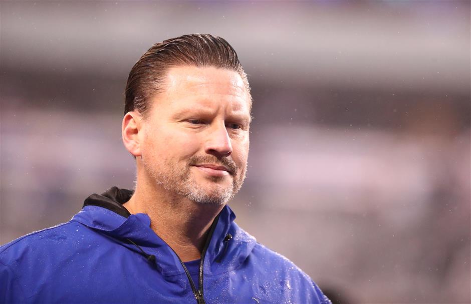 Reeling Giants fire coach McAdoo, GM Reese