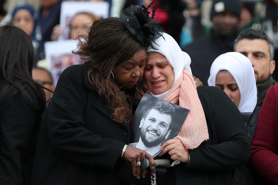 Six months on, Grenfell fire survivors weep at London memorial