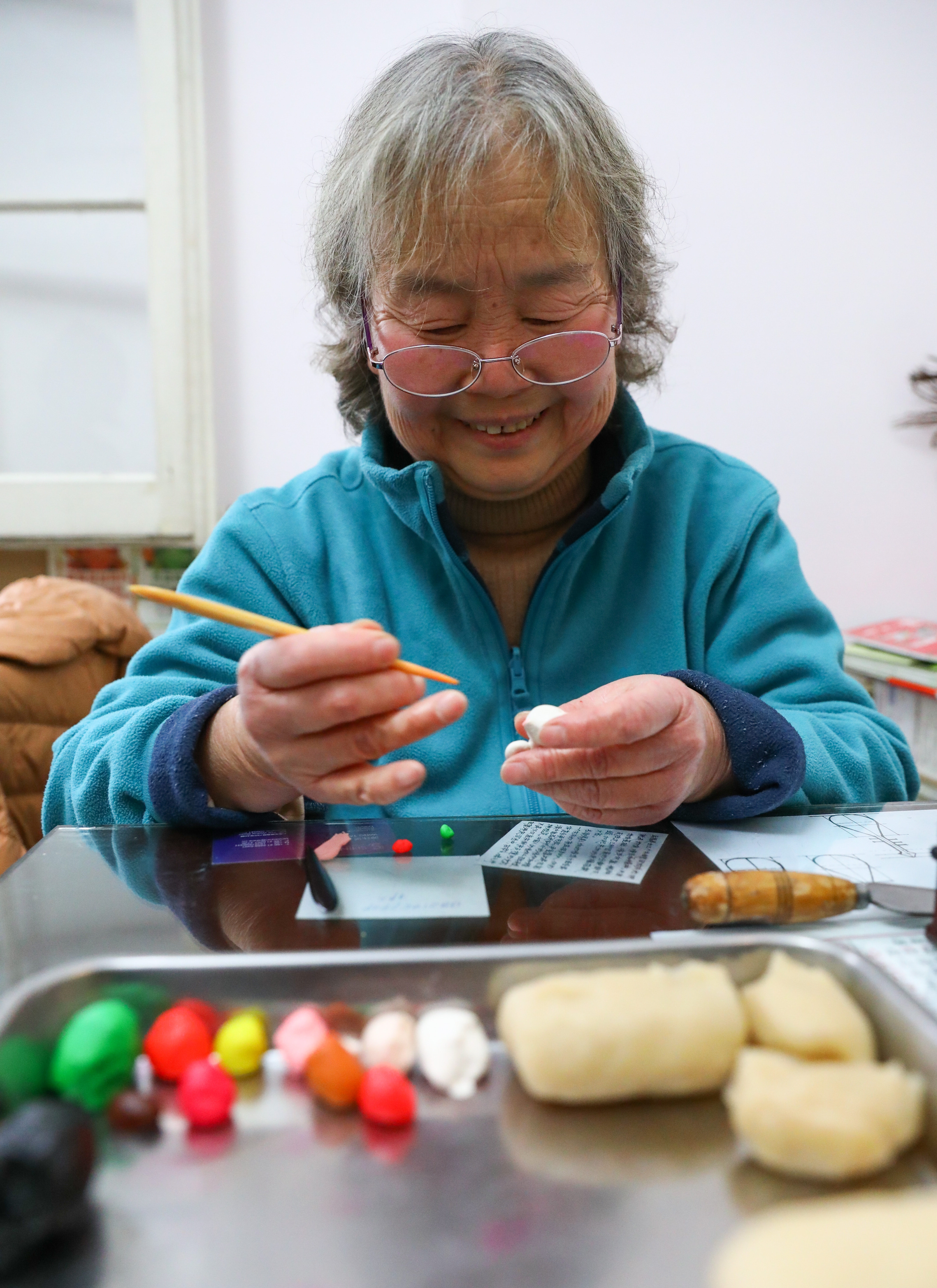 nimble fingers turn dough into delicate art