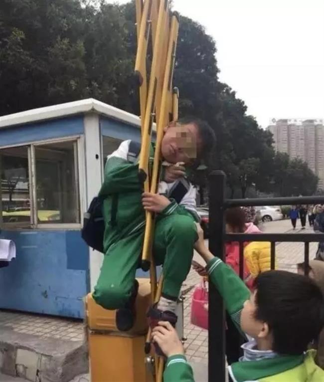 Boy taking shortcut stuck in rising traffic gate