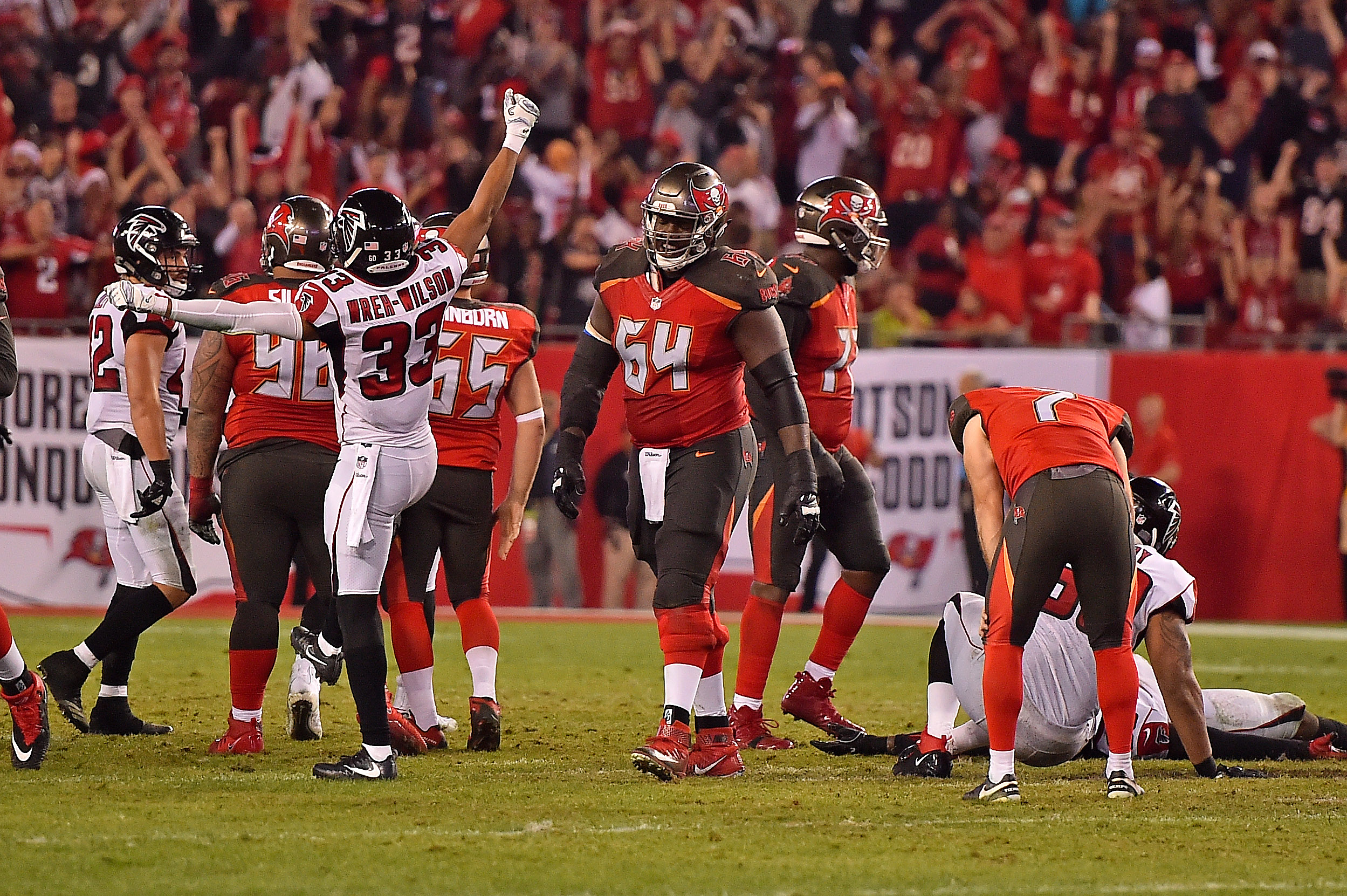 freeman shines as falcons hold off bucs