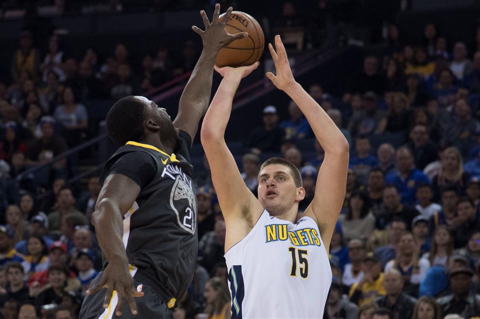 Nuggets halt Warriors' win streak at 11