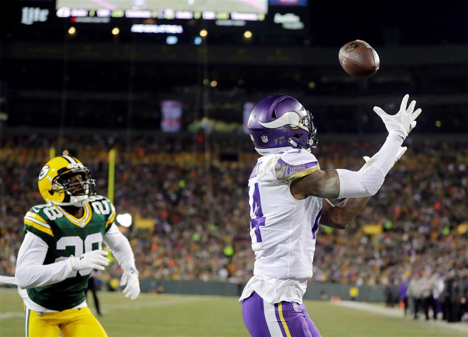 Ravens edge closer to playoff berth; Vikings shut out Packers