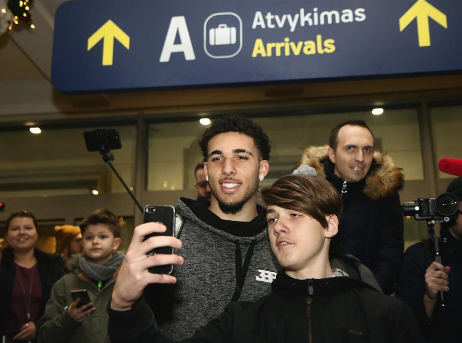 Ball brothers land in Lithuania with much fanfare on 'journey to NBA'