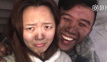 Young couple take selfies at home after fire