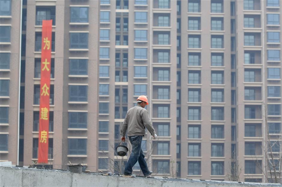 China to allow non-property enterprises, villages to build houses