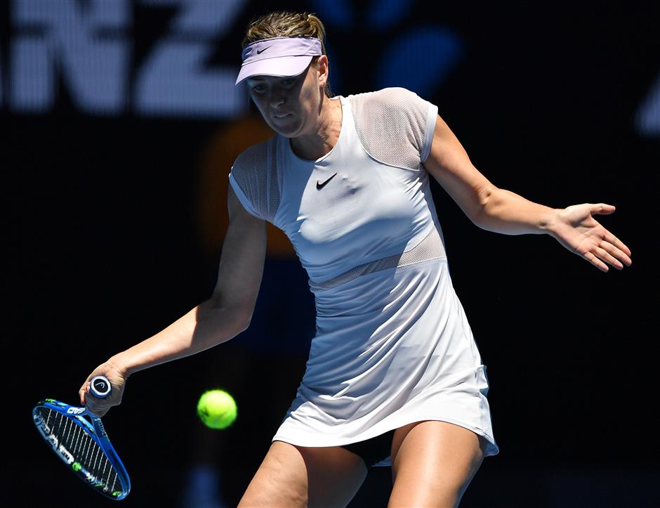 Sharapova joins Federer, Djokovic in the 2nd round of Australian Open