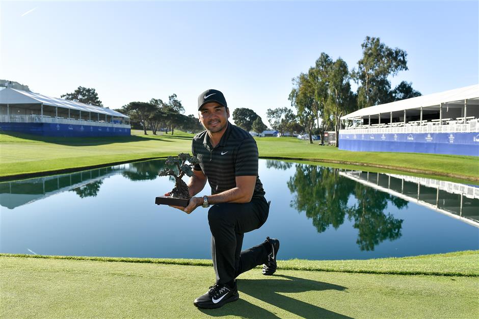 Li first Chinese male golfer to crack top 50