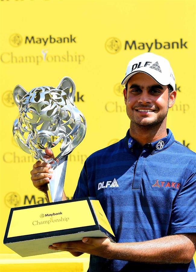 India's Sharma fires 10 birdies to seal title