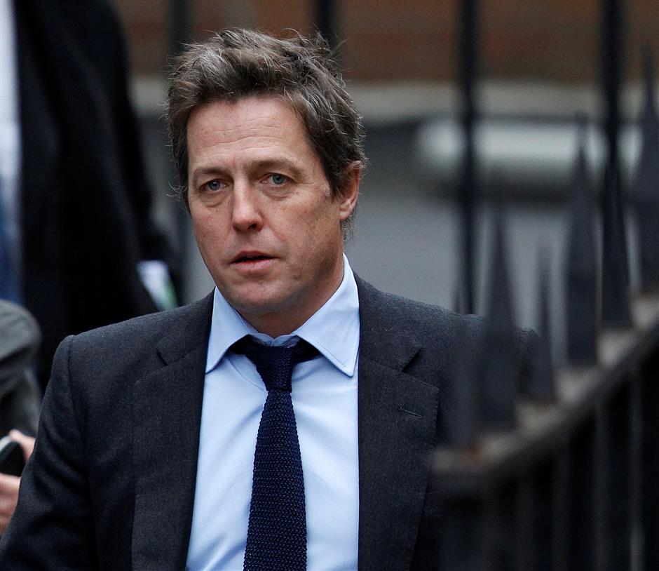 Hugh Grant settles phone-hacking claim against Mirror newspapers