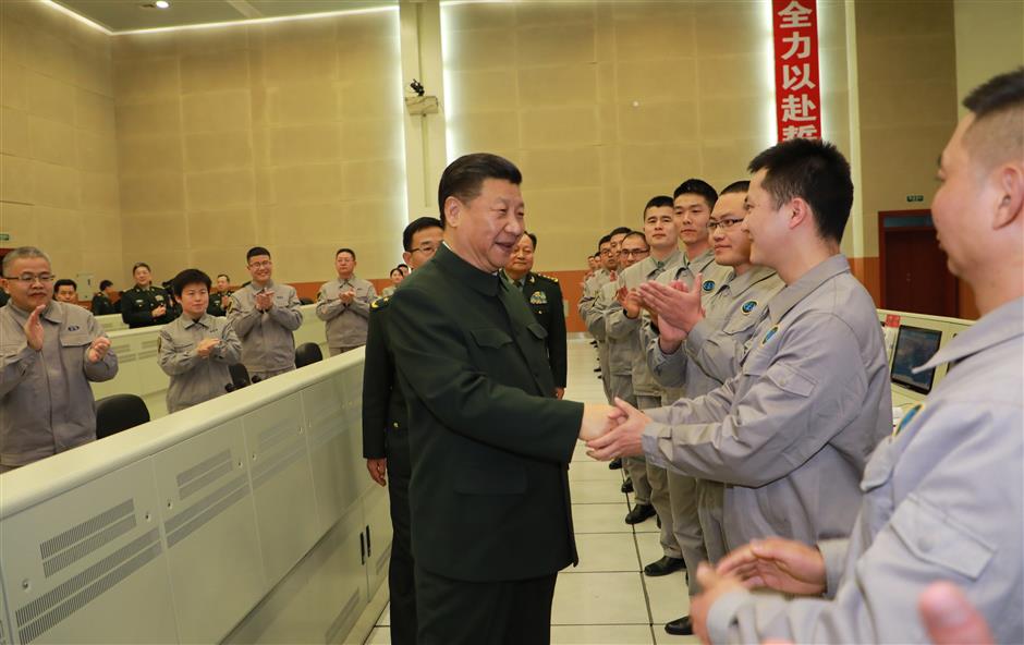 Xi visits military base, extends festival greetings to all servicemen