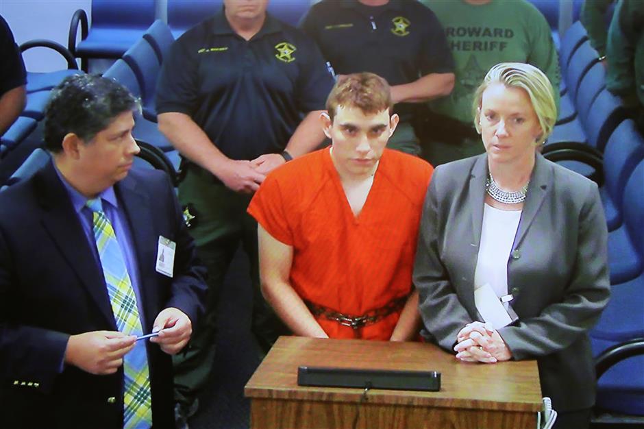 Former student confesses to Florida school shooting