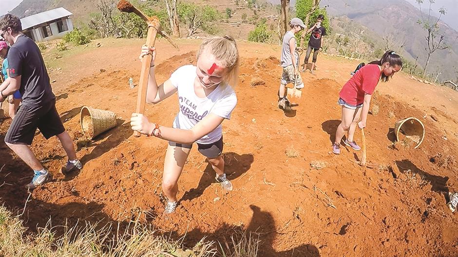 Lending a helping hand, in China and overseas