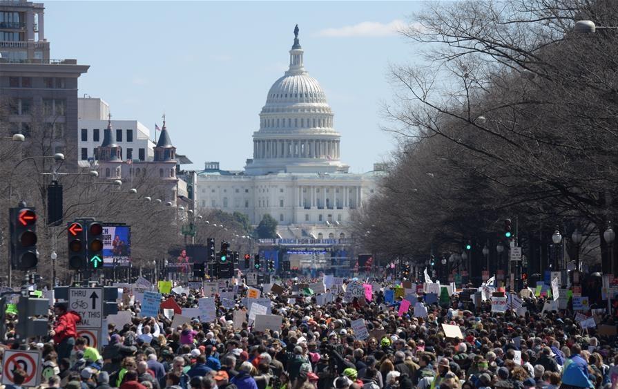 Hundreds of thousands of protesters rally in the US for gun control, school safety