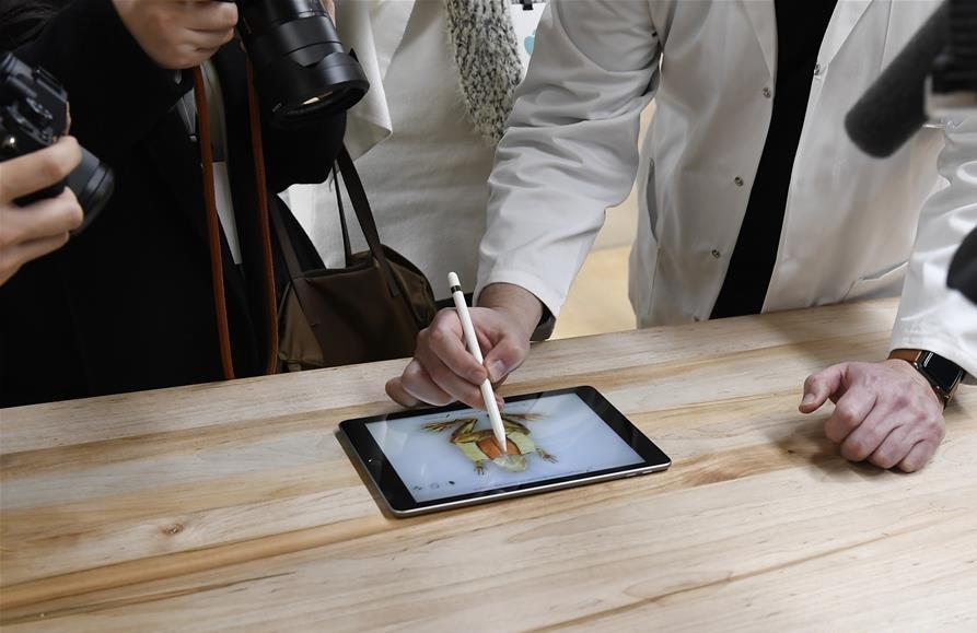 Apple unveils new iPad with pencil support at Chicago school